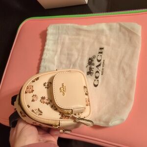 Coach Mini Court Backpack Bag Charm With Rosette Print in gold/blush multi